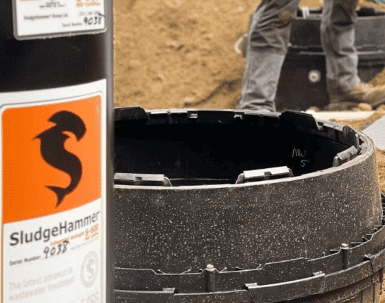 Septic tank installation sludgehammer system